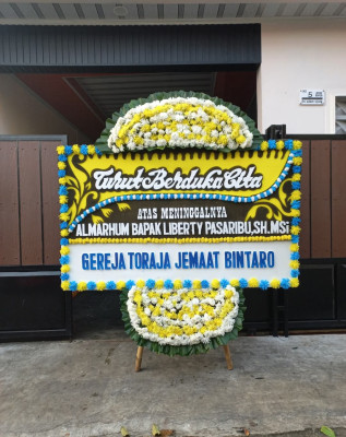 Papan Bunga Duka di Karangjaya